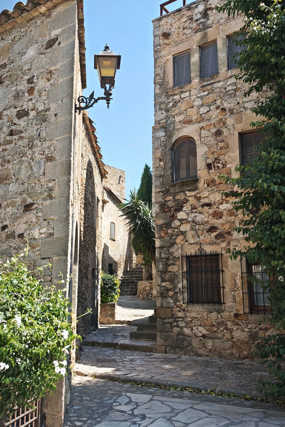 An alley and stone houses in the medieval town of Pals